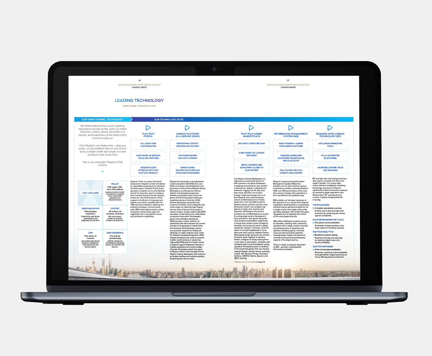 An image of a laptop showing a page from an annual report full of copy and graphics
