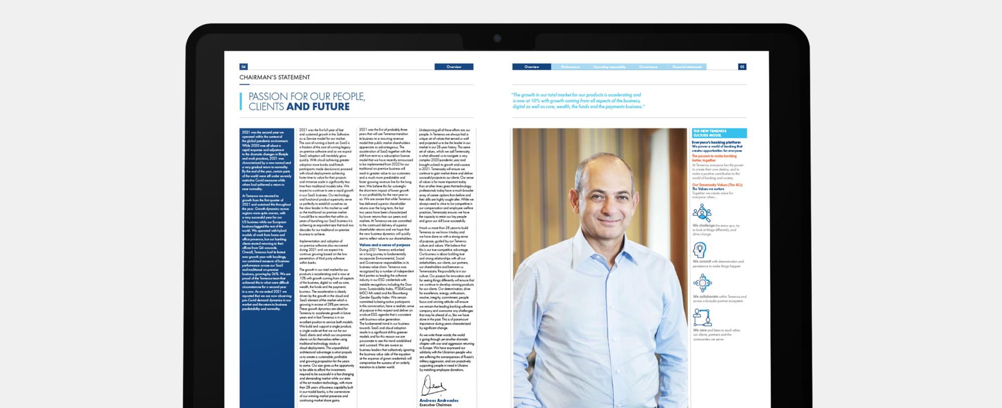An I-pad showing a spread from an annual report showing a business man and copy