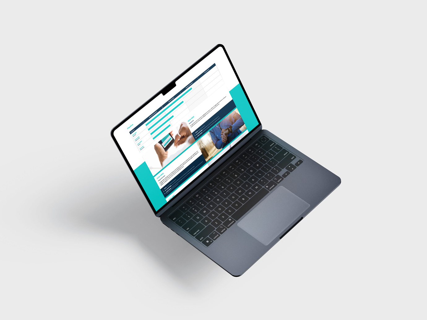 An open laptop showing a page from a website with graphics and images